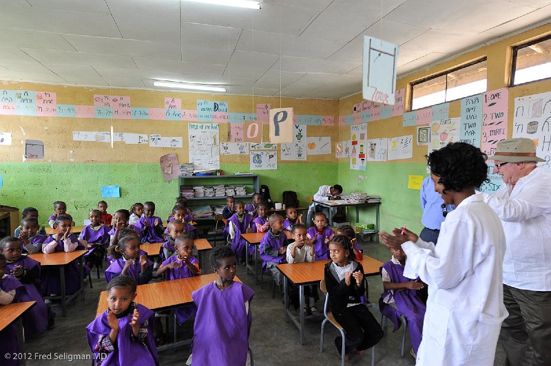 20120327_103031 Nikon D3 2x3.jpg - Teacher and Dr. Fish greeting the children